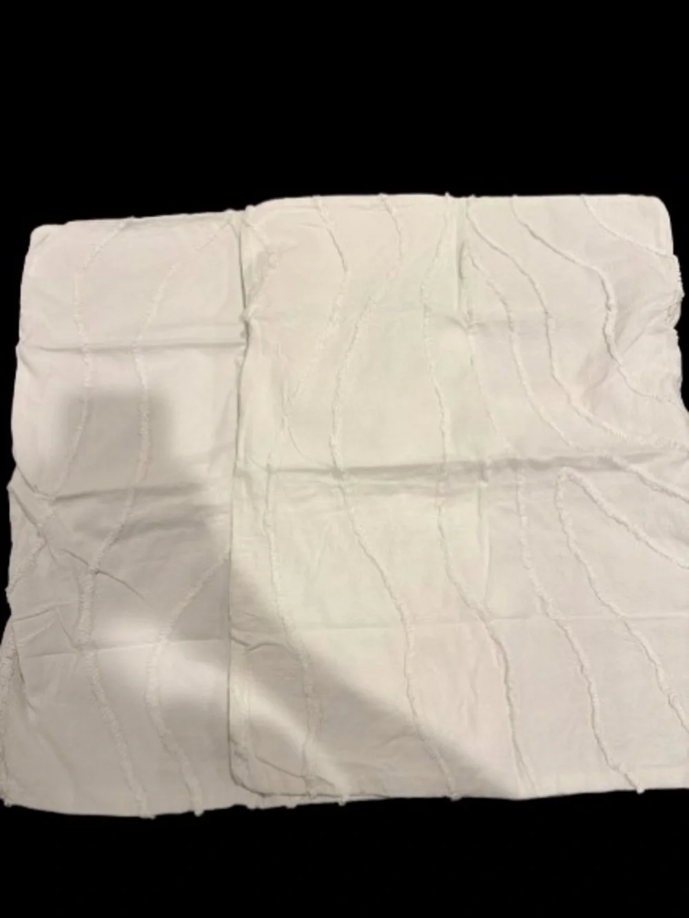 Urban Outfitters Cream Textured Fringe Duvet Cover includes 2 matching shams.
